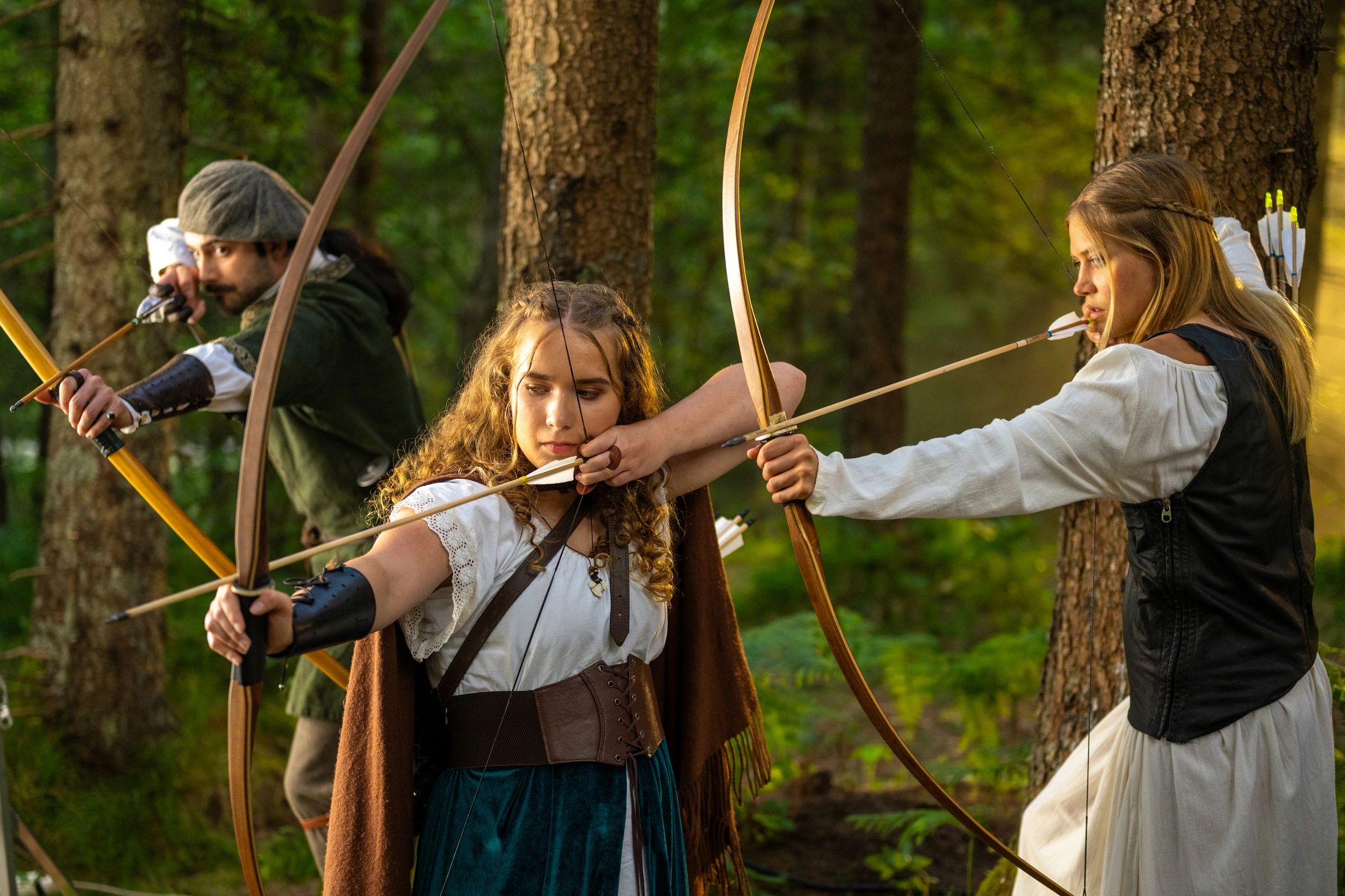 Archers in medieval attire at a renaissance-style event